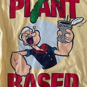 Popeye The Sailor "Plant Based" yellow t-shirt. size small. brand new